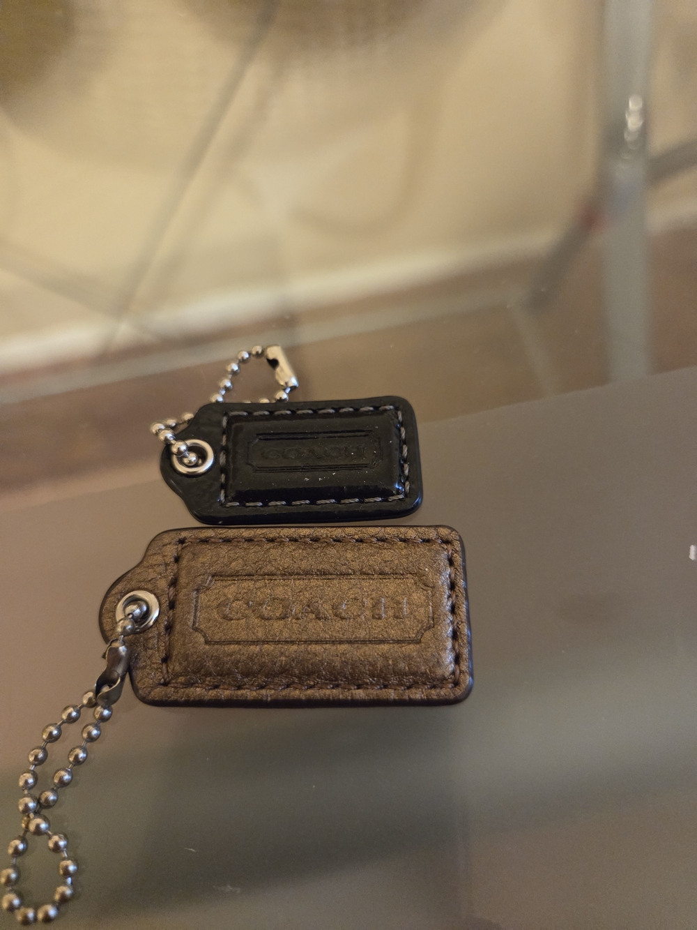 COACH Leather Logo Hangtags in Bronze and Black TWO